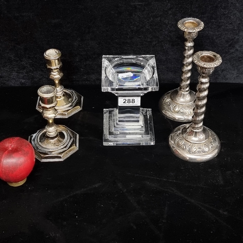 288 - Five candlesticks including two pairs of silverplate, and a lead crystal pillar candle example.