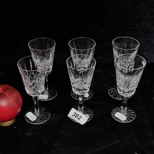 302 - A nice set of six Waterford Crystal stemmed glasses in the Lismore pattern. All in good condition wi... 