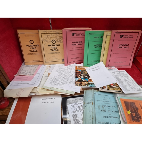 315 - A collection of vintage railway memorabilia featuring Irish Rail 'Working Timetables' including exam... 