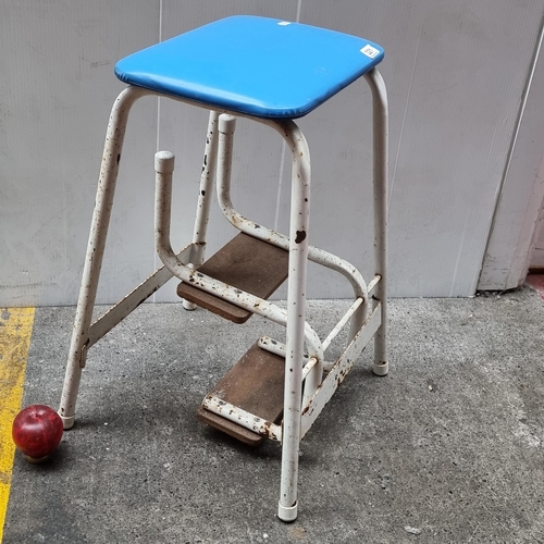 321 - A charming rustic foldable ladder stool with metal framework, wooden back slates and a blue leather ... 