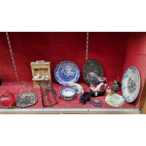 328 - A mixed lot containing a selection of items. Includes a ceramic 'CarrigWare' Polar Bear, a 'Spode' b... 