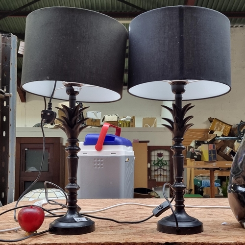 342 - A gorgeous pair of heavy large metal table lamps in a matte black finish with matching cylindrical s... 