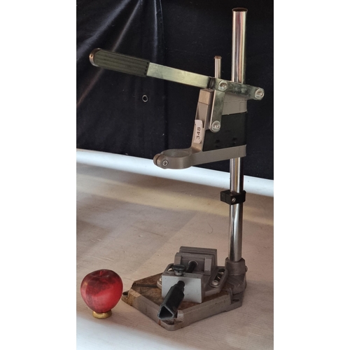 348 - A light drill stand with vacuum suction fixing base.