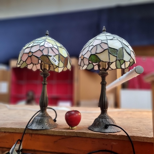 359 - Star Lot : A wonderful pair of heavy quality Tiffany style table lamps in attractive tones of pink, ... 