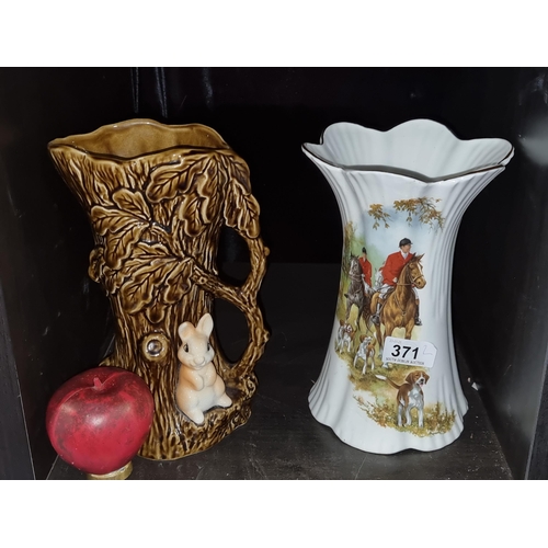 371 - Two ceramic vases including a Sylvac and Royal Tara example. Both in good condition.