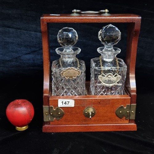 147 - Star Lot : A pair of cut glass decanters with labels 'Madeira' and 'Gin' complete with original stop... 