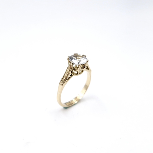 41 - A nine carat gold white topaz crown set ring. Size - J. Weight - 1.9 grams.