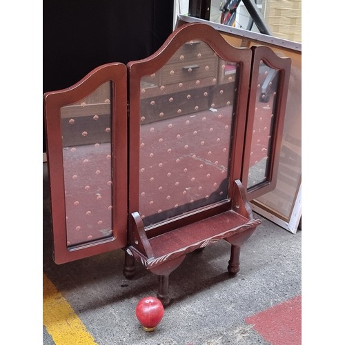 349 - A beautiful rosewood fire screen boasting a unique fabric displayed behind glass to each panel and m... 