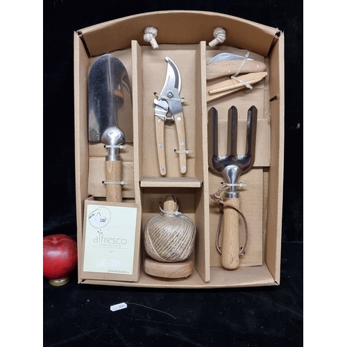 237 - A brand new Alfresco handcrafted gardening tool set includes a trowel, fork and twine. Spring just a... 