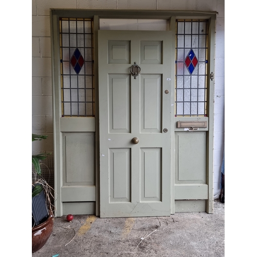 480 - Star Lot : An external front door with built in side panels and letter box featuring stained glass w... 