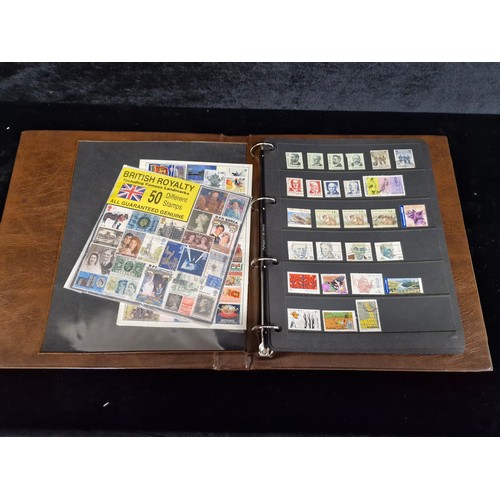 135 - A Royal Mail Universal stamp album containing stamps from Australia, Bangladesh, Canada, Mexico, Sin... 