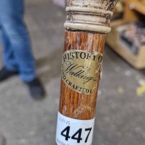 447 - A gorgeous early 20th century handcrafted gentleman's walking cane with falcon head handle