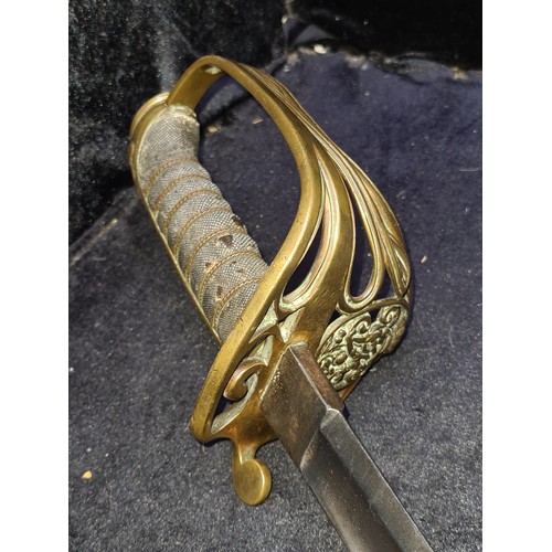 318 - Star Lot: An antique century Infantry Officer's Sword adorned with intricately carved handle. Comple... 