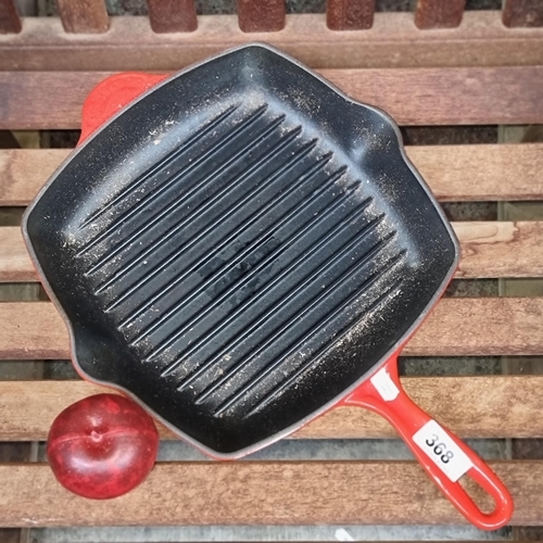 368 - A cast iron Le Creuset signature square grill pan in cerise red. RRP €169.00 via McElhinneys.