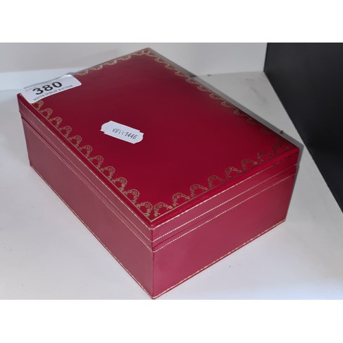 380 - A designer Red Cartier box for les Must de Cartier lighter. Includes gas re-filler and replacement f... 