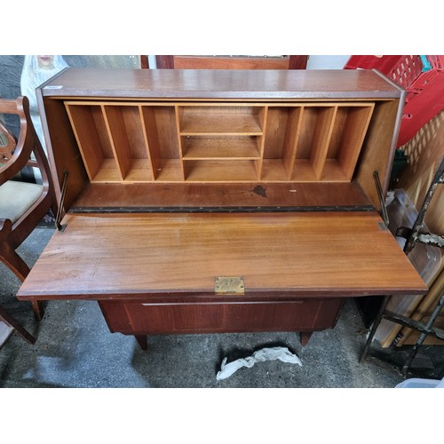 486 - Star Lot : A vintage Mid Century teak writing bureau / desk built by Irish SF Quinn cabinet-makers. ... 