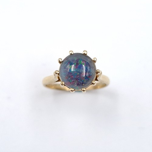 40 - A Beautiful Large Fire Opal ring (Opal - 8mm). Size - I. Weight - 1.87 grams. Mounted in 9ct gold.