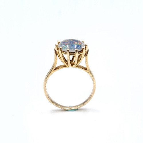 40 - A Beautiful Large Fire Opal ring (Opal - 8mm). Size - I. Weight - 1.87 grams. Mounted in 9ct gold.