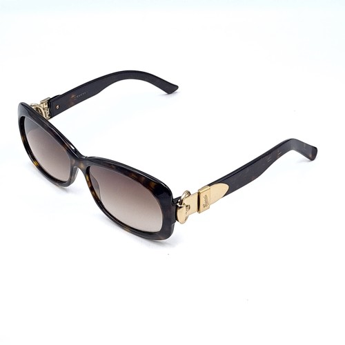 53 - A good pair of Gucci sunglasses with faux tortoise shell frame, marked 'Made in Italy'. Lenses clear... 