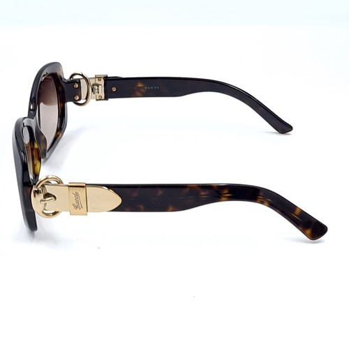 53 - A good pair of Gucci sunglasses with faux tortoise shell frame, marked 'Made in Italy'. Lenses clear... 