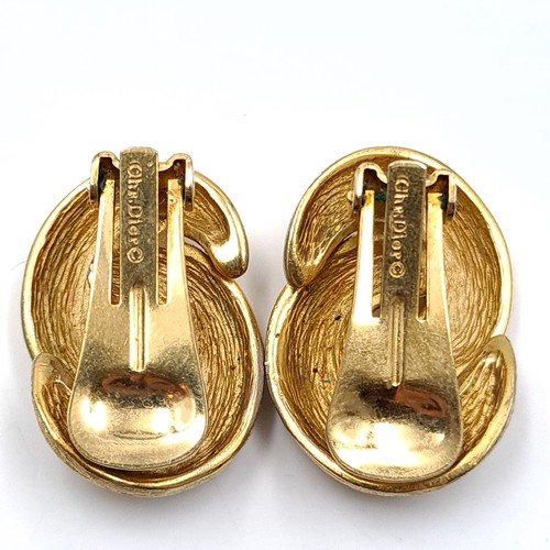 82 - A pair of original vintage designer earrings stamped Christian Dior to clasp. Dimensions: 3 x 2 cms.... 