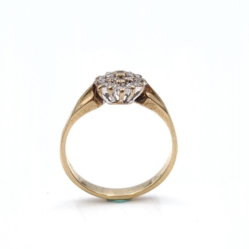 502 - Star Lot : A nine carat gold diamond cluster ring. Est. weight of diamonds - 0.3 carats. Size - M. W... 