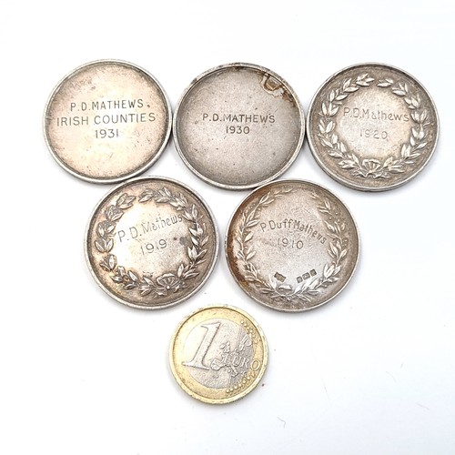 504 - A collection of five medallions relating to the Croquet cup awarded to Patrick Duff Matthews (Duffer... 