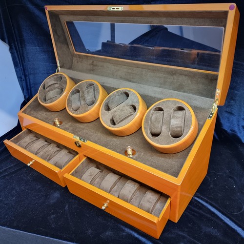 644 - Star Lot : A fabulous 16 piece auto-winding watch display case. Complete with two pull out drawers. ... 