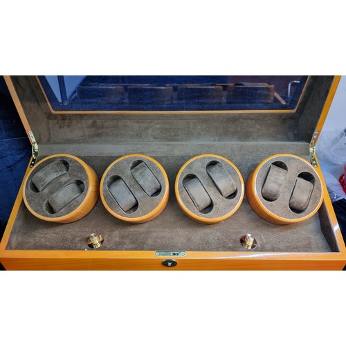 644 - Star Lot : A fabulous 16 piece auto-winding watch display case. Complete with two pull out drawers. ... 