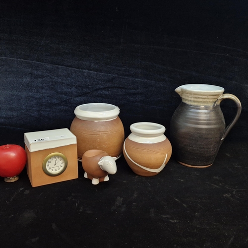 136 - Three pieces of Irish studio pottery by Stephen Pearce including a water pitcher jug and utensils po... 