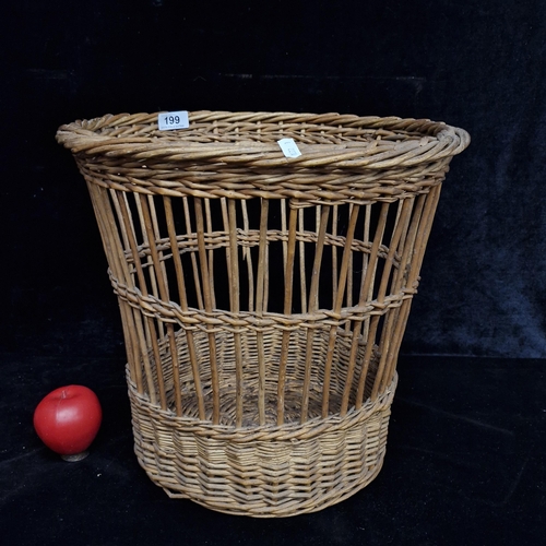 199 - A large antique  beautifully crafted handmade wicker basket.