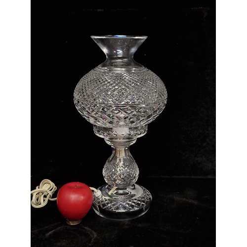 210 - Star Lot : A fabulous Waterford Crystal two piece hurricane lamp. Some very slight nibbles that are ... 