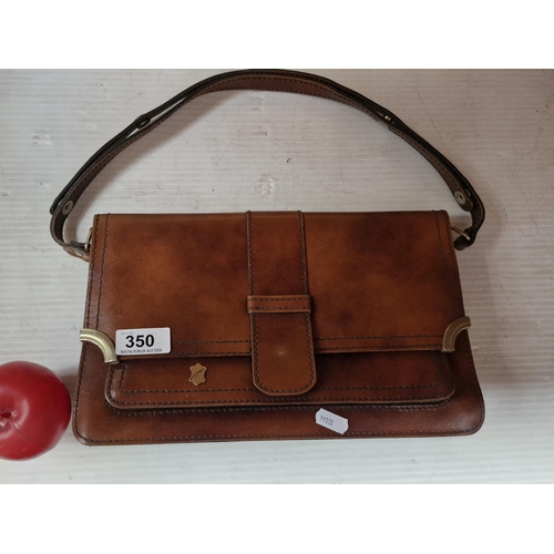 350 - An elegant 'Artsymul' brown leather bag.