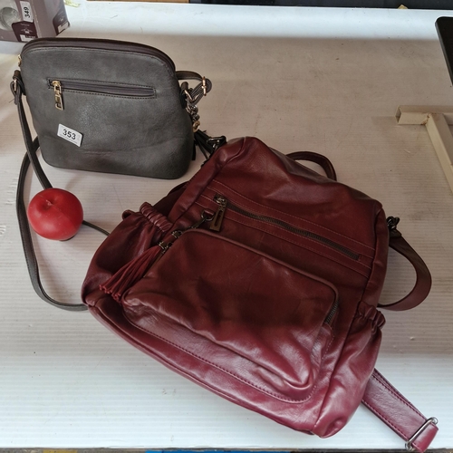 353 - A lovely grey shoulder bag. Along with a burgundy tone soft leather backpack.