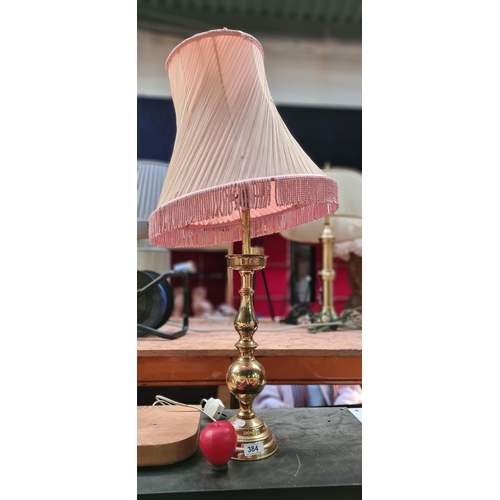 384 - A lovely vintage solid brass table lamp with dusty pink lamp shade with fringe