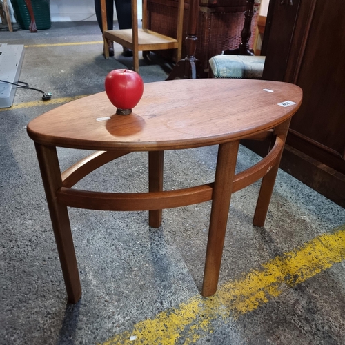 464 - A neatly sized mid century coffee table. Lovely shape and design.