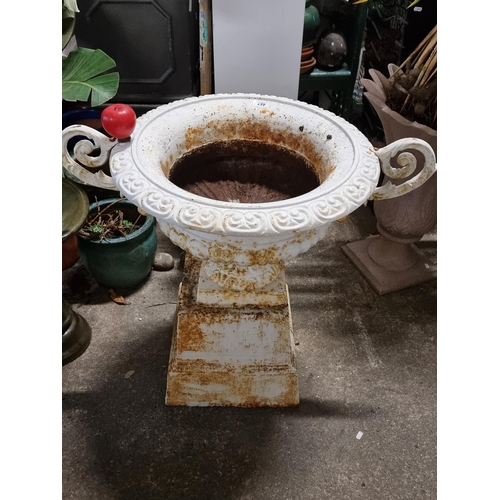 487 - Star Lot : A large, highly impressive and extremely heavy cast iron garden urn.