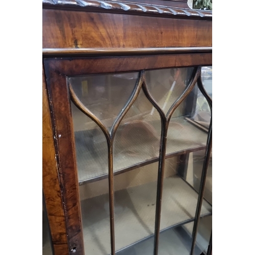 602 - Star Lot : A stunning Edwardian mahogany display cabinet, c.1900-1910, with glazed Gothic-style door... 