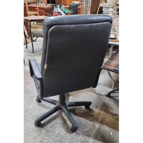 608 - An extremely comfortable leather high back office chair with adjustable height and swivel base.