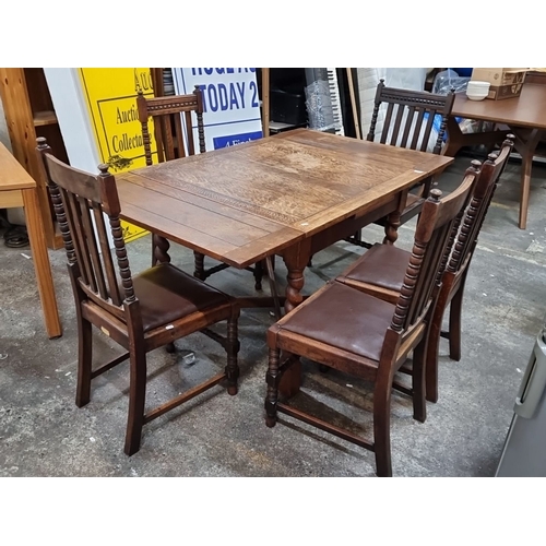 630 - A very handsome antique, early 20th-century oak dining set. Comprising of a barley-twist leg extendi... 