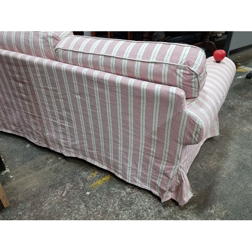 631 - A gorgeous candy striped two-seater sofa with removable covers. A well made sofa in good condition. ... 