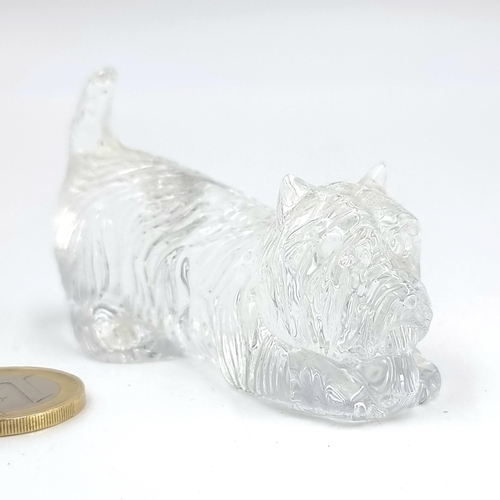 16 - A Waterford crystal (marked to base) Scottie dog. Length - 7 cms. Weight - 115 grams.