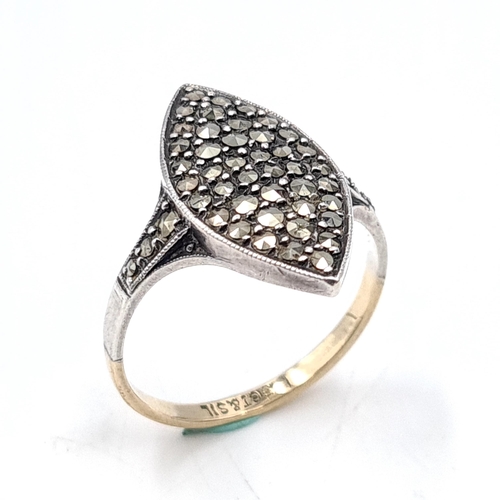 39 - A nine carat gold & silver marcasite ring. Size - P. Weight - 3.6 grams.