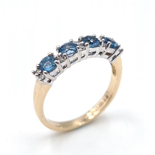 50 - Star Lot A stunning  nine carat gold aquamarine & diamond ring dated 1990. Size - K. Weight - 2.19 g... 