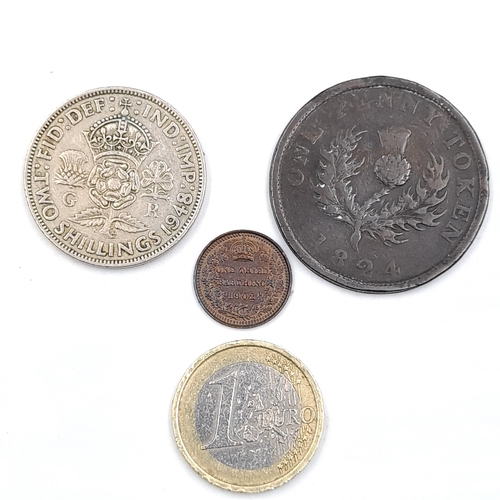 584 - A collection of three coins - a 1948 rare UK florin. Together with a 1902 1/3 UK farthing and a 1824... 