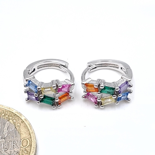 59 - A pair of sterling silver vari hue earrings suitable for pierced ears. Weight - 2.35 grams.