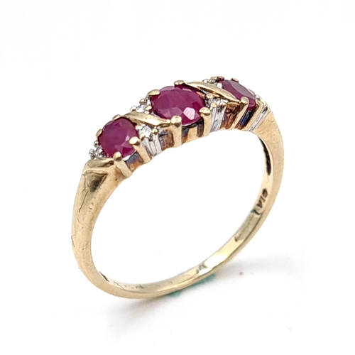 646 - Star Lot : A nine carat gold ruby stone ring with diamond accents. Ring size - P. Weight - 2.08 gram... 