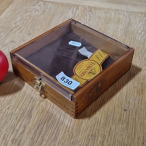 830 - A Vintage Tobajara Corona Sumatra No. 6 wooden cigar box features dovetail joints, a glass lid, and ... 