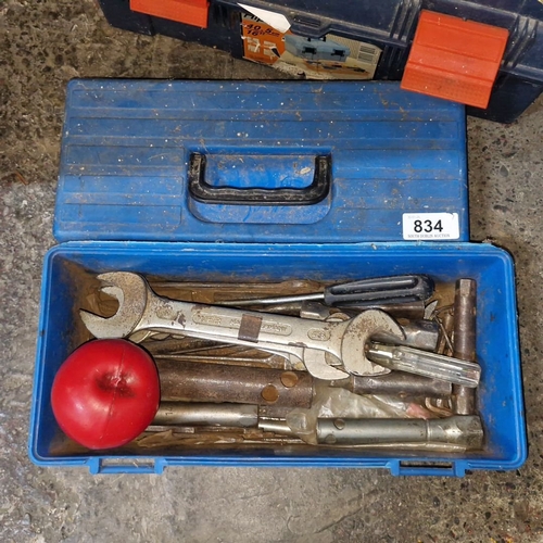 834 - A blue toolbox containing assorted hand tools and accessories. Includes wrenches, screwdrivers, and ... 