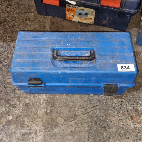 834 - A blue toolbox containing assorted hand tools and accessories. Includes wrenches, screwdrivers, and ... 